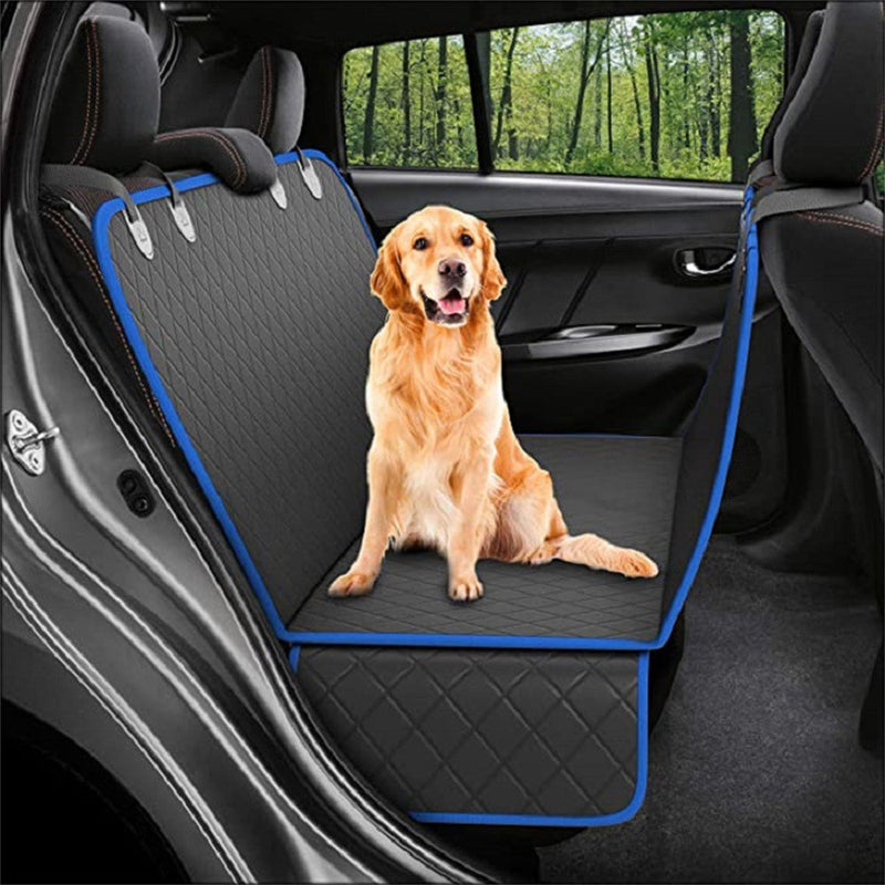 Black waterproof dog car seat cover installed with a dog in the back seat